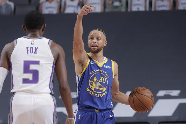 SACRAMENTO, CA - DECEMBER 17: Stephen Curry #30 of the Golden State Warriors handles the ball during a preseason game against the Sacramento Kings on December 17, 2020 at Golden 1 Center in Sacramento, California. NOTE TO USER: User expressly acknowledges and agrees that, by downloading and or using this Photograph, user is consenting to the terms and conditions of the Getty Images License Agreement. Mandatory Copyright Notice: Copyright 2020 NBAE (Photo by Rocky Widner/NBAE via Getty Images)