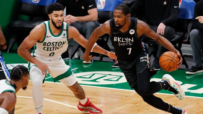 Kevin Durant, Kyrie Irving combine to key Nets' lopsided victory over Celtics | CBC Sports