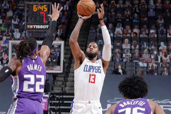 SACRAMENTO, CA - JANUARY 15: Paul George #13 of the LA Clippers shoots a 3-pointer during the game against the Sacramento Kings on January 15, 2021 at Golden 1 Center in Sacramento, California. NOTE TO USER: User expressly acknowledges and agrees that, by downloading and or using this Photograph, user is consenting to the terms and conditions of the Getty Images License Agreement. Mandatory Copyright Notice: Copyright 2021 NBAE (Photo by Rocky Widner/NBAE via Getty Images)