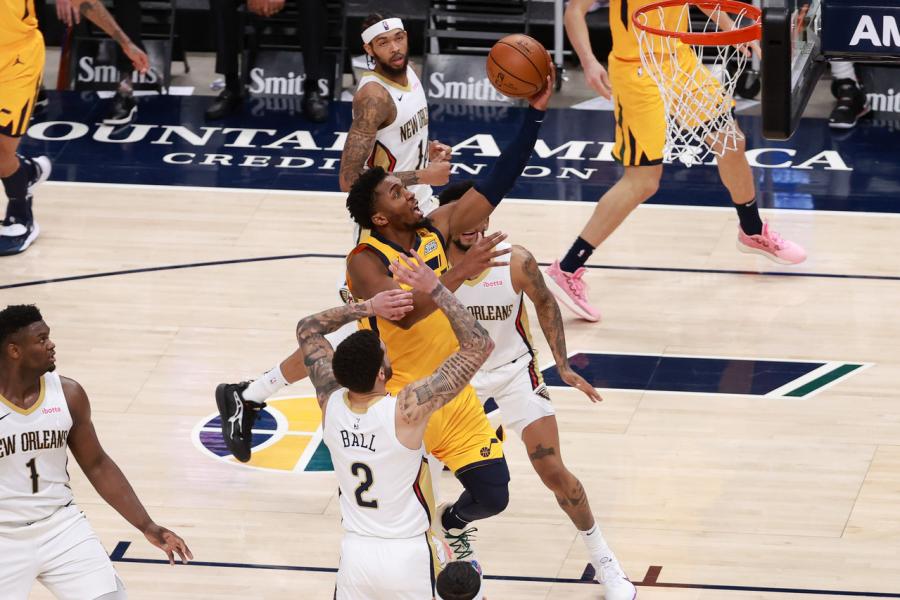 Jan 19, 2021; Salt Lake City, Utah, USA; Utah Jazz guard Donovan Mitchell (45) goes to the basket past New Orleans Pelicans guard Lonzo Ball (2) during the fourth quarter at Vivint Smart Home Arena. Mandatory Credit: Chris Nicoll-USA TODAY Sports