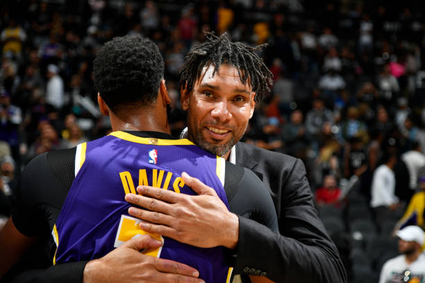 SAN ANTONIO, TX - NOVEMBER 3: Anthony Davis #3 of the Los Angeles Lakers and Assistant Coach Tim Duncan of the San Antonio Spurs hug after a game on November 3, 2019 at the AT&T Center in San Antonio, Texas. NOTE TO USER: User expressly acknowledges and agrees that, by downloading and or using this photograph, user is consenting to the terms and conditions of the Getty Images License Agreement. Mandatory Copyright Notice: Copyright 2019 NBAE (Photos by Logan Riely/NBAE via Getty Images)