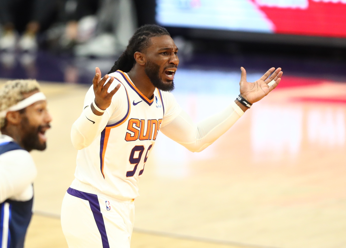 Dec 23, 2020; Phoenix, Arizona, USA; Phoenix Suns forward Jae Crowder (99) reacts against the Dallas Mavericks in the first half at Phoenix Suns Arena. Mandatory Credit: Mark J. Rebilas-USA TODAY Sports