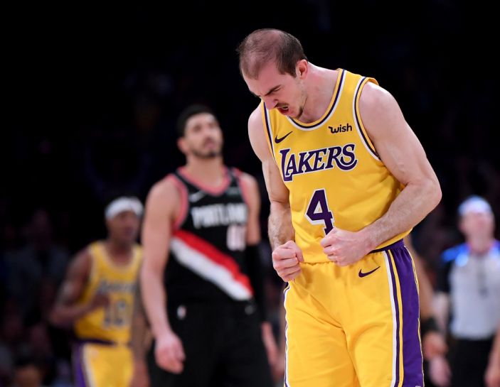 LOS ANGELES, CALIFORNIA - APRIL 09: Alex Caruso #4 of the Los Angeles Lakers celebrates his basket to take a lead over the Portland Trail Blazers during a 104-101 Trail Blazer win at Staples Center on April 09, 2019 in Los Angeles, California. (Photo by Harry How/Getty Images) NOTE TO USER: User expressly acknowledges and agrees that, by downloading and or using this photograph, User is consenting to the terms and conditions of the Getty Images License Agreement.