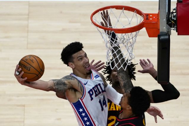 Young's 26 points lead Hawks past short-handed 76ers, 112-94
