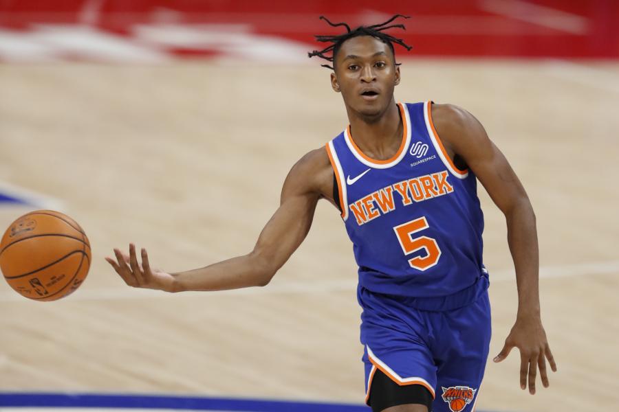 Dec 13, 2020; Detroit, Michigan, USA; New York Knicks guard Immanuel Quickley (5) passes the ball during the second quarter against the Detroit Pistons at Little Caesars Arena. Mandatory Credit: Raj Mehta-USA TODAY Sports