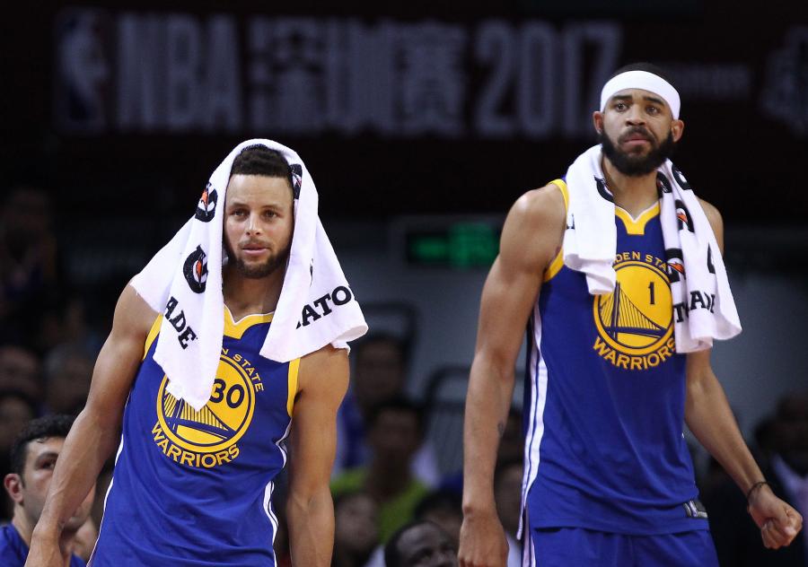 SHENZHEN, CHINA - OCTOBER 05: Stephen Curry #30 and JaVale McGee #1 of the Golden State Warriors react during the game between the Minnesota Timberwolves and the Golden State Warriors as part of 2017 NBA Global Games China at Universidade Center on October 5, 2017 in Shenzhen, China. (Photo by Zhong Zhi/Getty Images) ORG XMIT: 775022678 ORIG FILE ID: 857779736