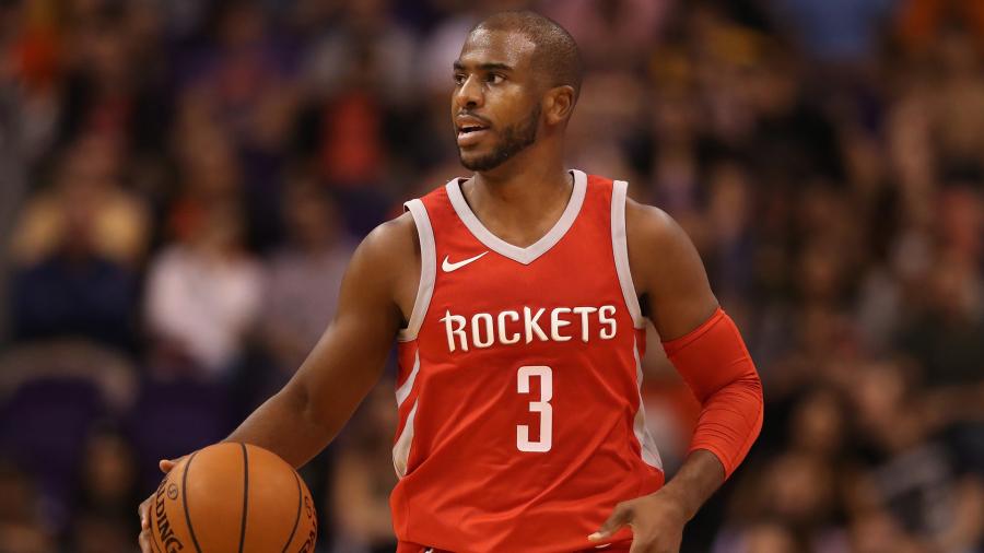 PHOENIX, AZ - NOVEMBER 16: Chris Paul #3 of the Houston Rockets handles the ball during the first half of the NBA game against the Phoenix Suns at Talking Stick Resort Arena on November 16, 2017 in Phoenix, Arizona. The Rockets defeated the Suns 142-116. NOTE TO USER: User expressly acknowledges and agrees that, by downloading and or using this photograph, User is consenting to the terms and conditions of the Getty Images License Agreement. (Photo by Christian Petersen/Getty Images)