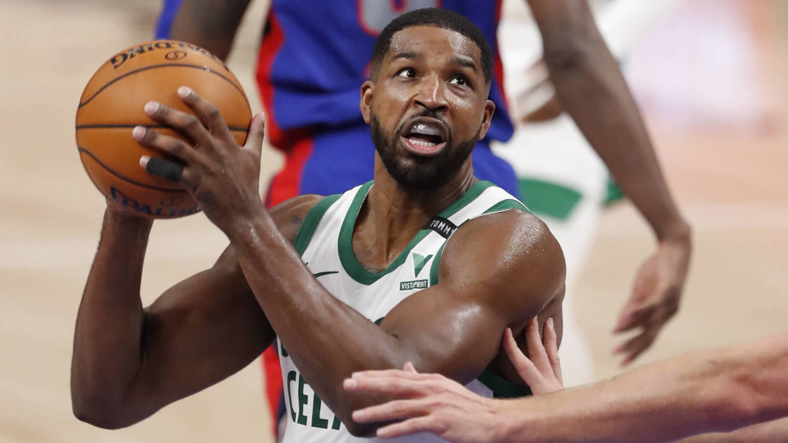 Jan 3, 2021; Detroit, Michigan, USA; Boston Celtics center Tristan Thompson (13) gets defended by Detroit Pistons center Mason Plumlee (24) during the third quarter at Little Caesars Arena. Mandatory Credit: Raj Mehta-USA TODAY Sports