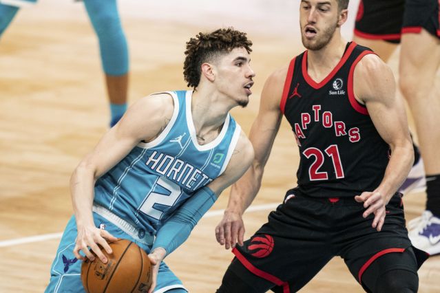 LaMelo Ball leads Hornets past short-handed Raptors 114-104