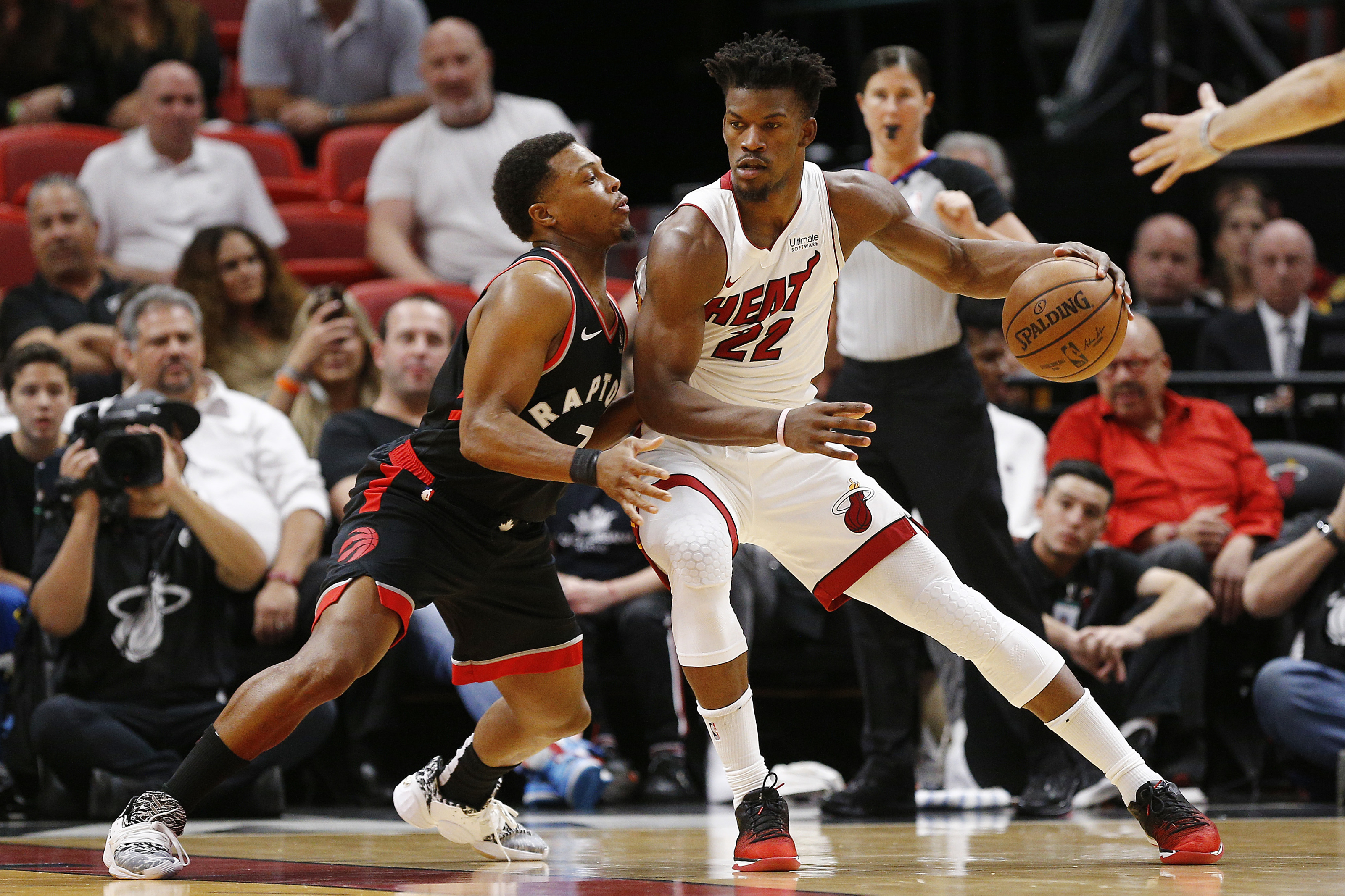 MIAMI, FLORIDA - JANUARY 02: Jimmy Butler #22 of the Miami Heat drives to the basket against Kyle Lowry #7 of the Toronto Raptors during the first half at American Airlines Arena on January 02, 2020 in Miami, Florida. NOTE TO USER: User expressly acknowledges and agrees that, by downloading and/or using this photograph, user is consenting to the terms and conditions of the Getty Images License Agreement. (Photo by Michael Reaves/Getty Images)