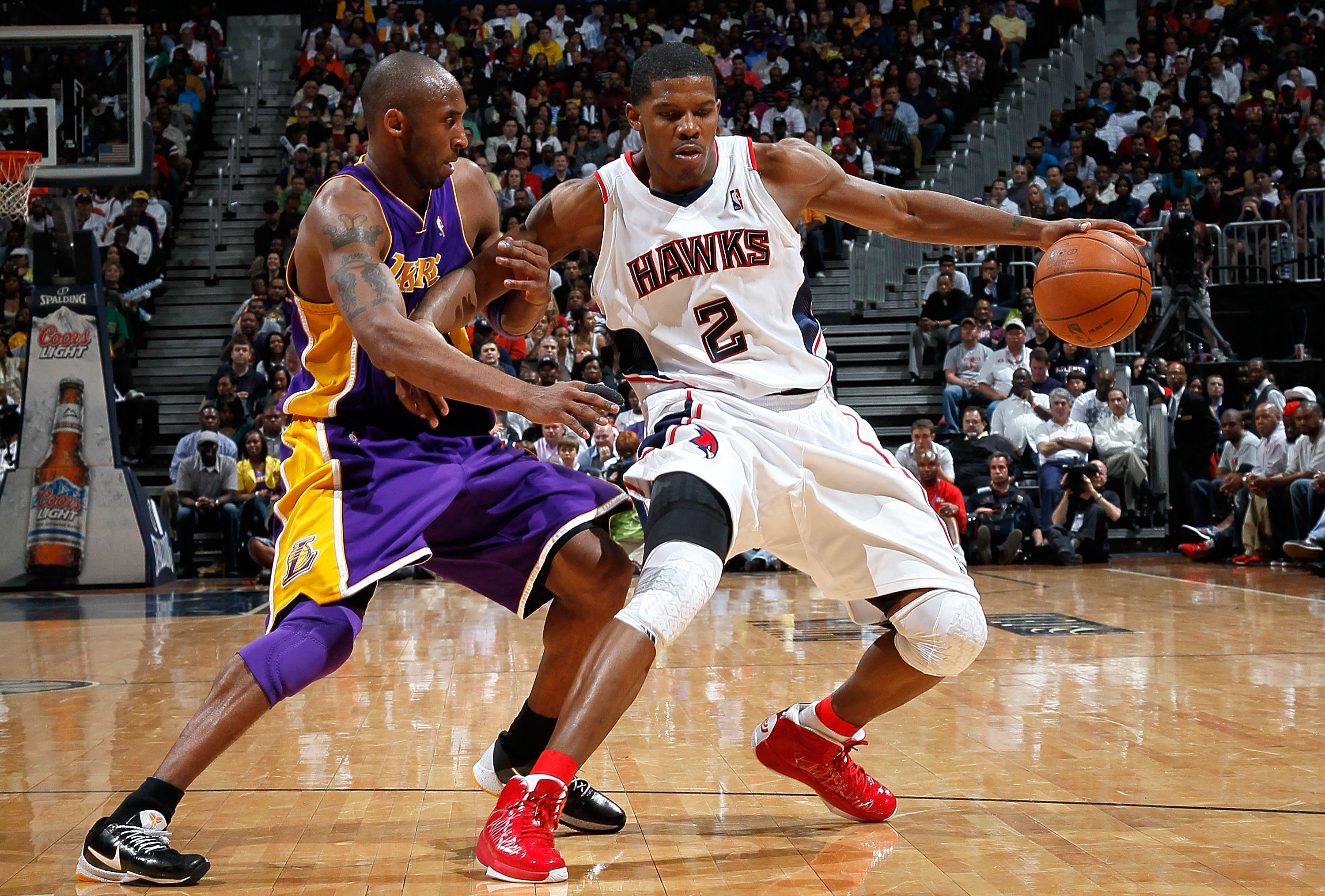 ATLANTA - MARCH 31: Joe Johnson #2 of the Atlanta Hawks drives against Kobe Bryant #24 of the Los Angeles Lakers at Philips Arena on March 31, 2010 in Atlanta, Georgia. NOTE TO USER: User expressly acknowledges and agrees that, by downloading and/or using this Photograph, User is consenting to the terms and conditions of the Getty Images License Agreement. (Photo by Kevin C. Cox/Getty Images)
