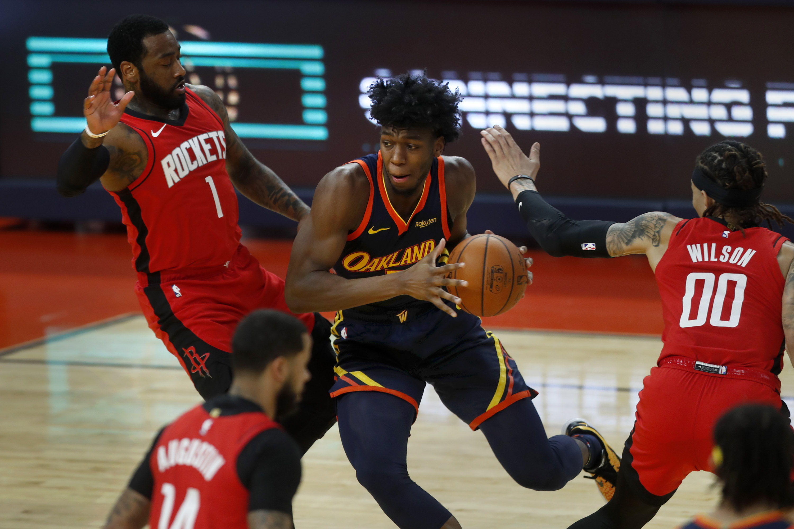 SAN FRANCISCO, CA - APRIL 10: Golden State Warriors' James Wiseman (33) drives on the Houston Rockets' ArmoniBrooks (1) in the first quarter of their basketball game, Saturday, April 10, 2021, at Chase Center in San Francisco, Calif. (Karl Mondon/Bay Area News Group)