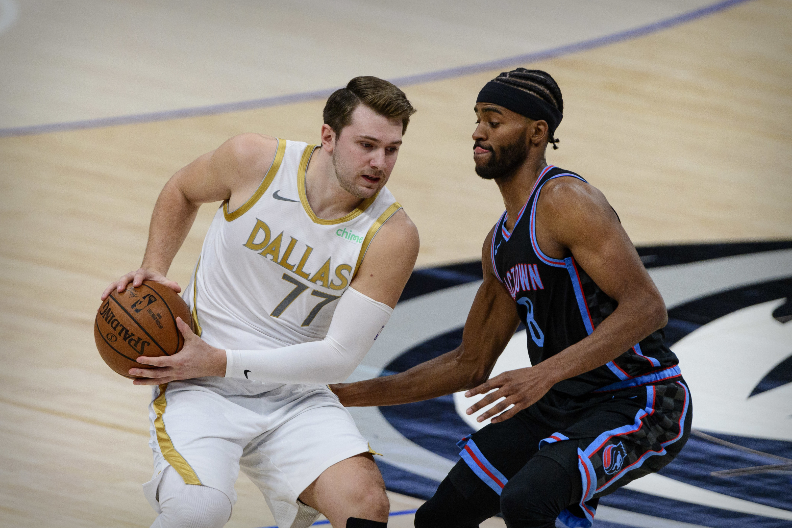 Apr 18, 2021; Dallas, Texas, USA; Sacramento Kings forward Maurice Harkless (8) defends against Dallas Mavericks guard Luka Doncic (77) during the first quarter at the American Airlines Center. Mandatory Credit: Jerome Miron-USA TODAY Sports