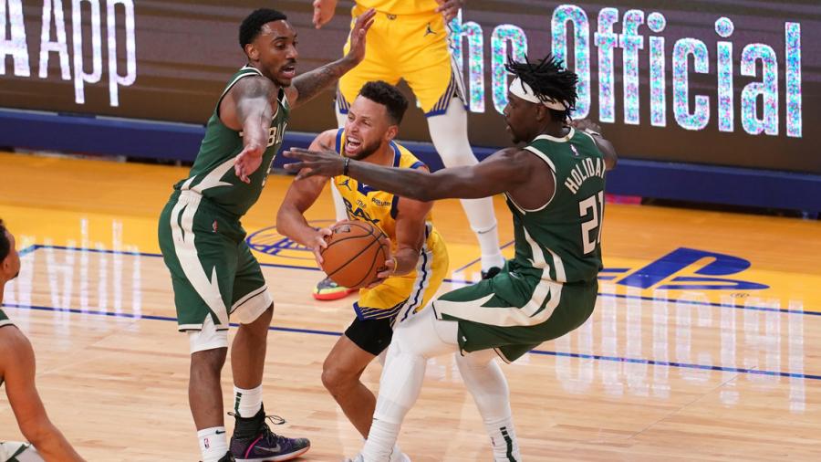 Steph Curry pours in 41 as Warriors rally past Bucks