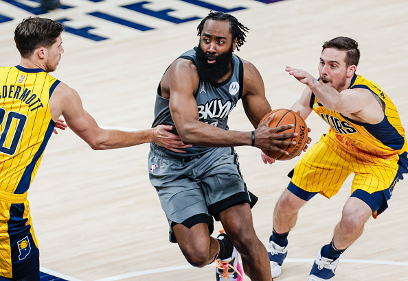 INDIANAPOLIS, IN - MARCH 17: James Harden #13 of the Brooklyn Nets dribbles the ball against the Indiana Pacers at Bankers Life Fieldhouse on March 17, 2021 in Indianapolis, Indiana. NOTE TO USER: User expressly acknowledges and agrees that, by downloading and or using this photograph, User is consenting to the terms and conditions of the Getty Images License Agreement. (Photo by Michael Hickey/Getty Images)