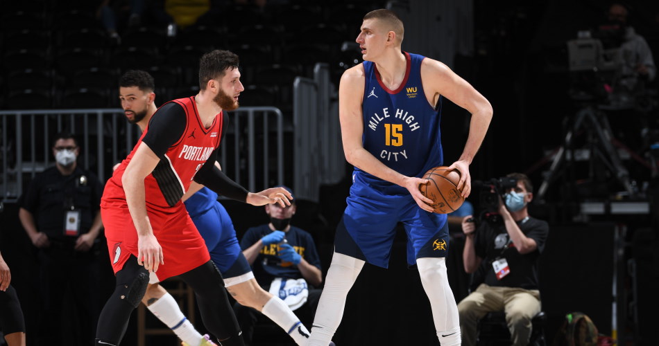 67ac2320-jusuf-nurkic-guards-nikola-jokic-blazers-at-nuggets-game-1-getty-images