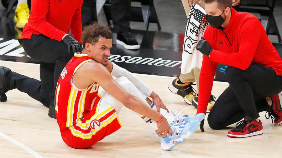 Hawks&#39; Trae Young sprains ankle after stepping on referee&#39;s foot in Game 3 vs. Bucks, returns after brief exit - CBSSports.com
