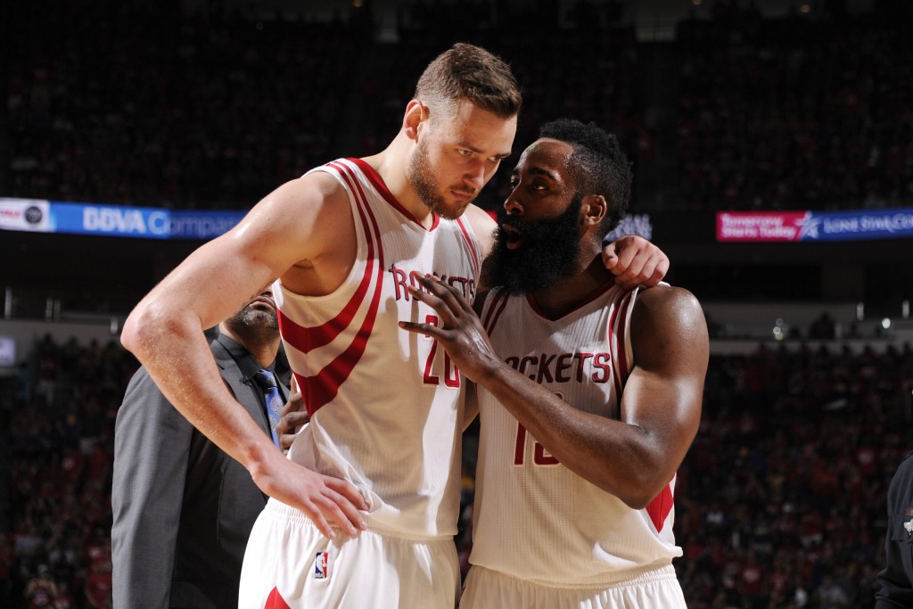 HOUSTON, TX - APRIL 24:  James Harden #13 of the Houston Rockets and Donatas Motiejunas #20 of the Houston Rockets talk during the game against the Golden State Warriors in Game Four of the Western Conference Quarterfinals during the 2016 NBA Playoffs on April 24, 2016 at the Toyota Center in Houston, Texas. NOTE TO USER: User expressly acknowledges and agrees that, by downloading and or using this photograph, User is consenting to the terms and conditions of the Getty Images License Agreement. Mandatory Copyright Notice: Copyright 2016 NBAE (Photo by Bill Baptist/NBAE via Getty Images)