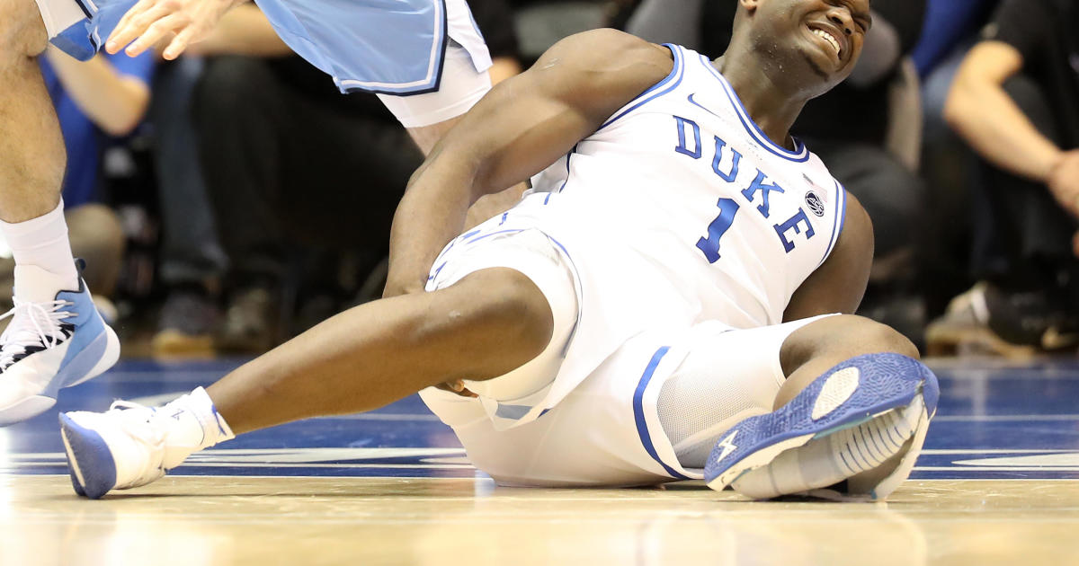 DURHAM, NORTH CAROLINA - FEBRUARY 20: (EDITORS NOTE: Retransmission with alternate crop.) Zion Williamson #1 of the Duke Blue Devils reacts after falling as his shoe breaks against Luke Maye #32 of the North Carolina Tar Heels during their game at Cameron Indoor Stadium on February 20, 2019 in Durham, North Carolina. (Photo by Streeter Lecka/Getty Images)