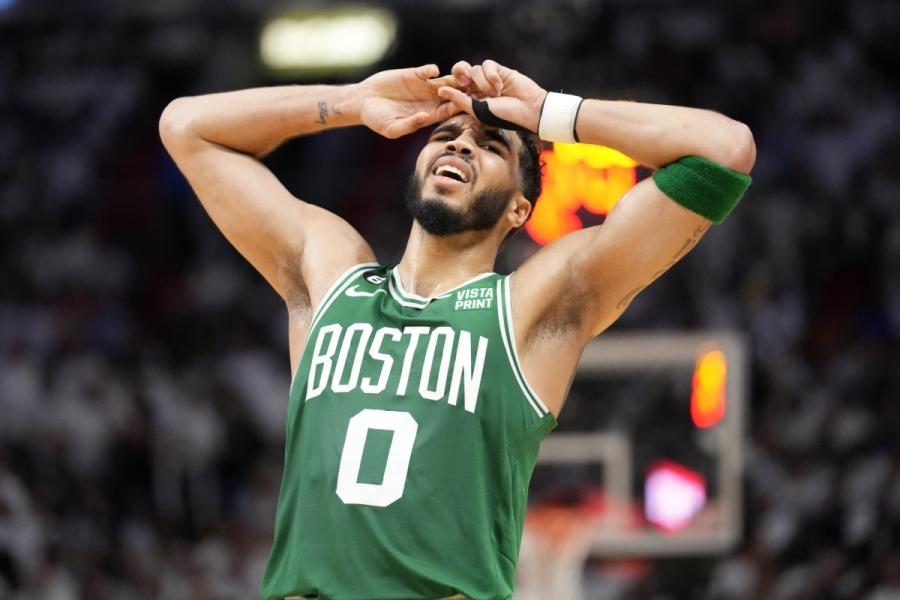 Boston Celtics forward Jayson Tatum (0) reacts in the second quarter  against the Miami Heat during game six of the Eastern Conference Finals for  the 2023 NBA playoffs at Kaseya Center. | HoopsHype