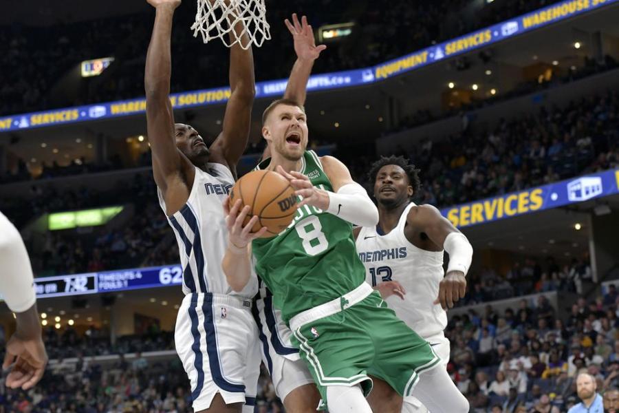 Kristaps Porzingis dominates inside and Celtics survive undermanned  Grizzlies - The Boston Globe